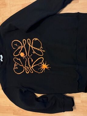 Loewe Black Crewneck Sweater with Orange Logo Graphic
